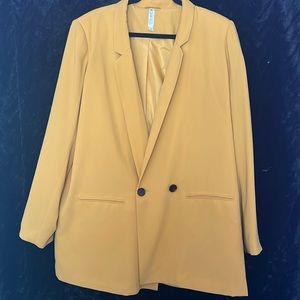 Mustard Yellow Blazer with black button detail. NEVER WORN